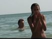 Watch these smooth nudists play at a public beach